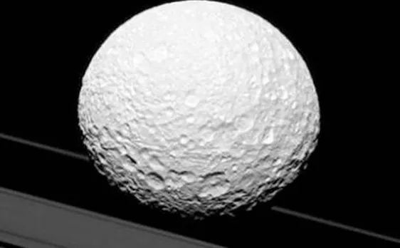 New NASA Cassini picture: Is Saturn's moon Mimas heading for collision with the planet's rings?
