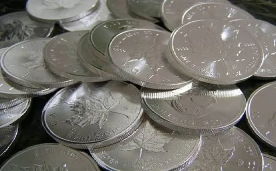 Silver loses shine by Rs 208 on profit booking