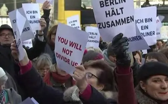Berlin truck attack: Germany launches manhunt for 'violent and armed' Tunisian suspect 