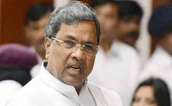 Video | Karnataka CM Siddaramaiah caught on camera getting his shoe laces tied by a person, issues clarification