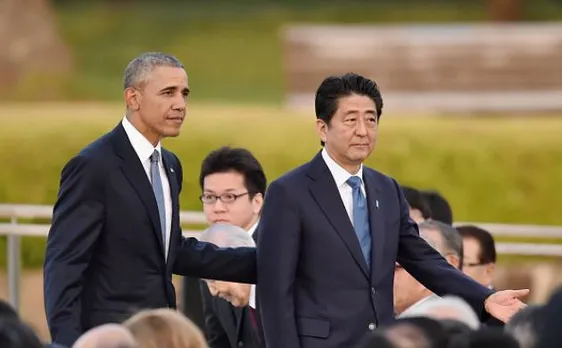 Obama-Abe talk about peace at historic Pearl Harbor visit