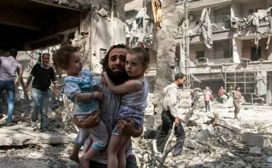 Fifteen civilians killed near Damascus in air strikes and artillery fire, says monitor