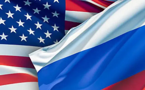 Russian diplomats expelled from US over meddling in presidential elections arrive in Moscow