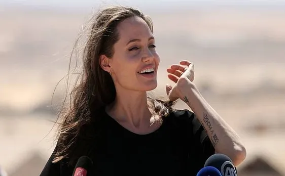Angelina Jolie promotes her new movie; cooks, eats tarantulas with children on live TV