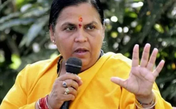 Uma Bharti leads cleanliness drive at Ganga's Kedarghat, Manikarnika and Jad Bharat