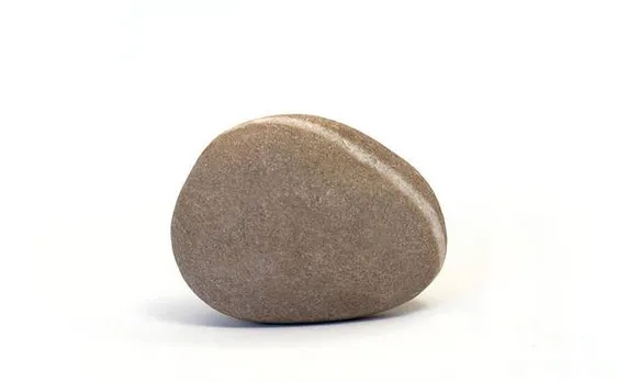 Stone weighing 1.4 kg removed from  urinary bladder of a patient in Gujarat