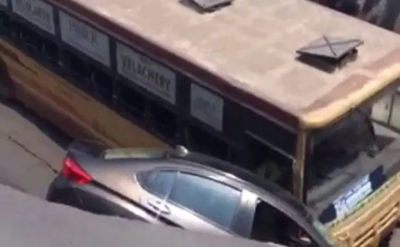 Bus, car plunge in crater as Chennai road caves in