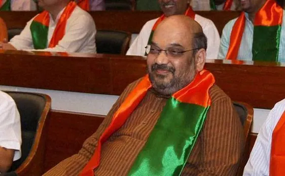 BJP president Amit Shah gets enthusiastic welcome from partymen; offered two lotus garlands