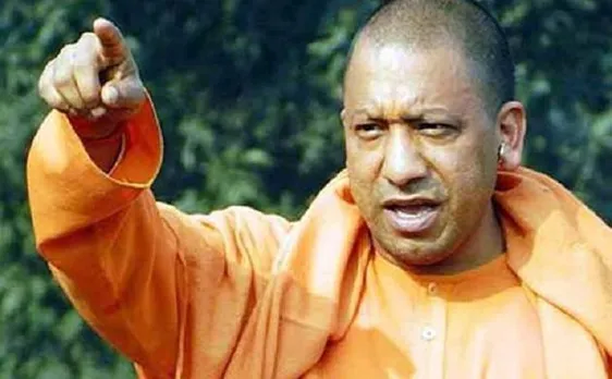 UP CM Yogi Adityanath faces criticism for sharing stage with murder-accused MLA