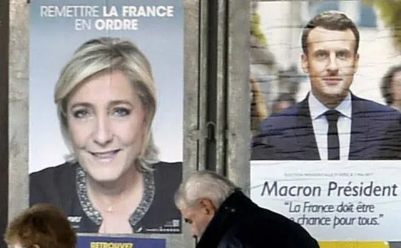 French voters go to polls to choose between Emmanuel Macron, Marine Le Pen as President