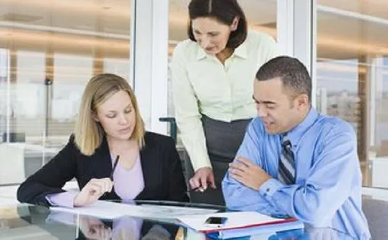 Helping co-workers may lead to unhealthy work environment, says study