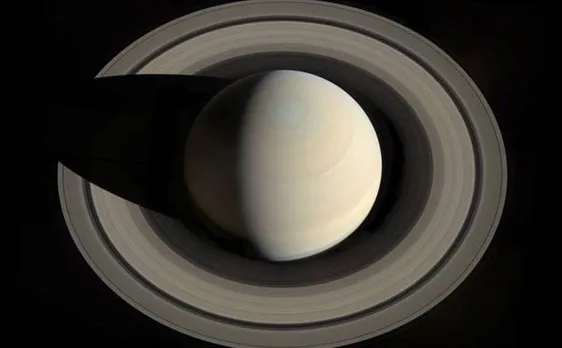 Saturn's miniatures versions created by electrifying tiny droplets of fluids
