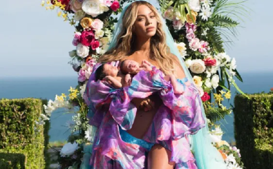Beyonce looks like a fairy in this picture with her twins