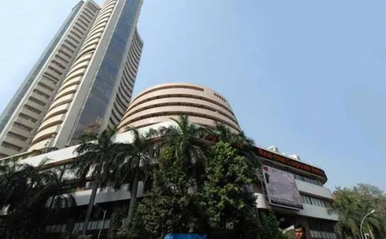 Sensex jumps 216 pts after exit polls give BJP an edge