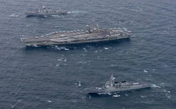 China warns of counter measures after US warship sails through