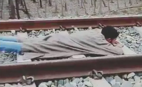 WATCH | Kashmiri youth lets speeding train run over him, people demand action