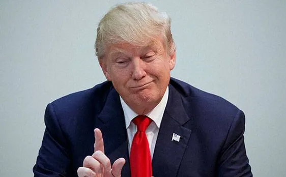 President Trump finally admits he sometimes tweets while in bed