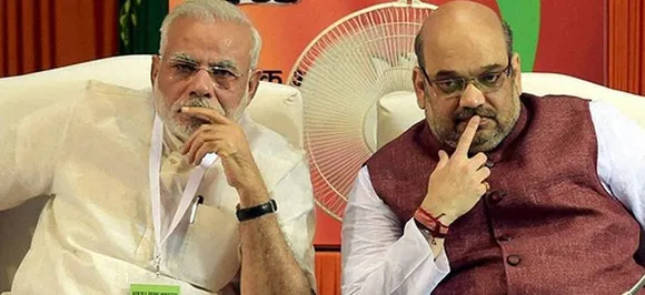 Where were PM Modi and Amit Shah when BS Yeddyurappa was sworn in?