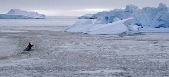 Huge iceberg near Greenland village sparks flooding fears