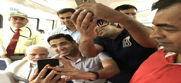 PM Modi takes Airport Metro ride to Dwarka event; passengers take selfies with him