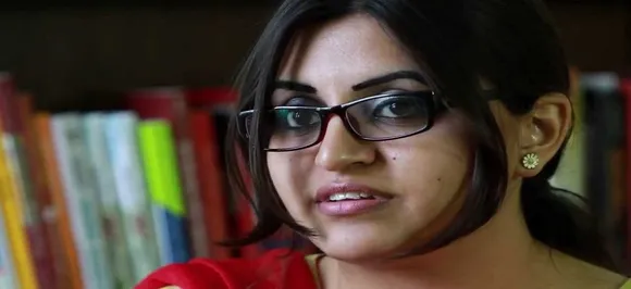 Award-winning rights activist detained as she returns to Pakistan