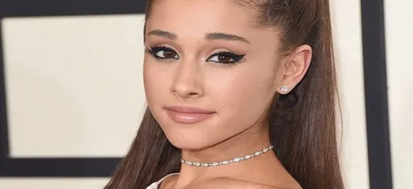 Ariana Grande hides her 'Pete' tattoo with a band-aid, wears engagement ring no more
