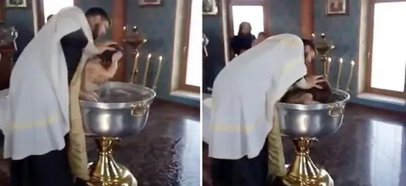 Russian Orthodox Priest forcefully baptises 2-year-old girl, Video goes viral