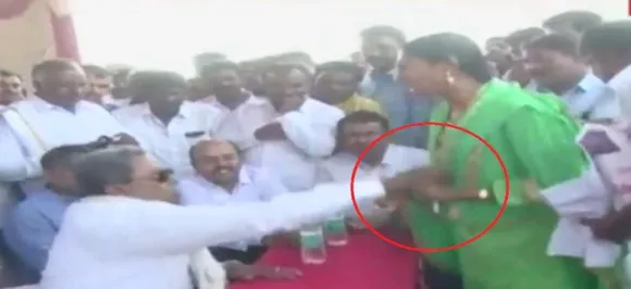 Watch: Former Karnataka CM Siddaramaiah misbehaves with woman in Mysuru, video goes viral