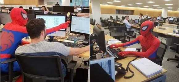 WATCH | Peter Parker is in the office! No, itâ€™s just a banker dressed up as Spiderman after resignation on his last day of work 