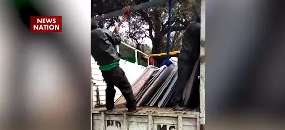 Watch: NDMC removes posters of Priyanka Gandhi Vadra, Rahul Gandhi from Congress headquarters  