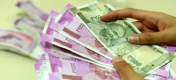 Rupee slips 11 paise to 71.34 against US Dollar on crude oil scare