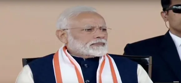 PM Modi unveils 800-kg 'Bhagavad Gita' in Delhi after IAF strike, gets a rousing welcome