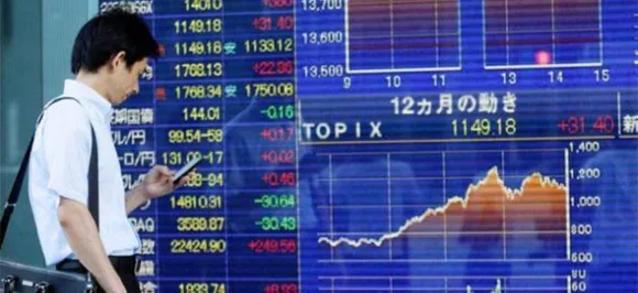 Pound edges up after Brexit delay but Asian markets retreat