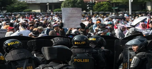 Protesters clash with Indonesian police after election loss