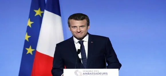 France's Macron backs Merkel for EU post - if she wants it