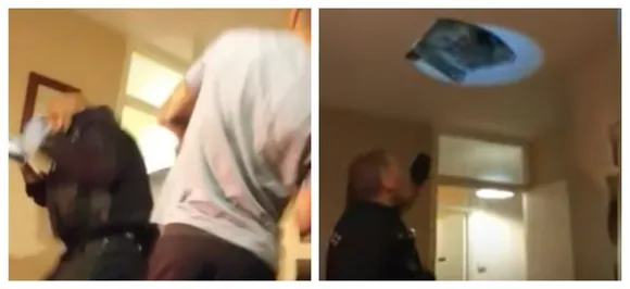 WATCH| Wanted man hiding in attic falls right on top of cops looking for him 