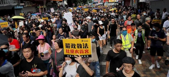Clashes erupt as Hong Kong protest targets Chinese traders