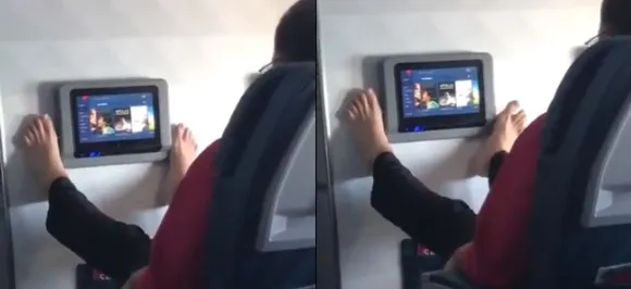Watch: Airline passenger uses toes to operate in-flight entertainment, leaves internet divided