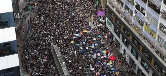Hong Kong protesters egg China office during massive pro-democracy rally