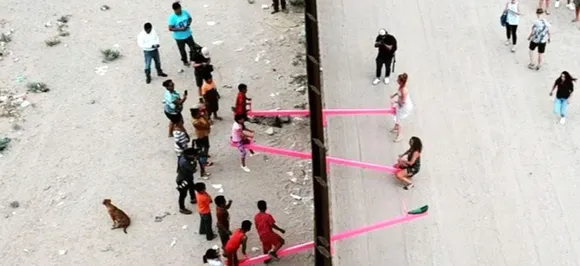 How pink seesaws on US-Mexico border help kids play together and bridge divide 