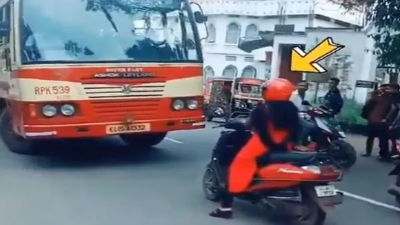 WATCH: Woman On Scooty Forces Bus Driver To Take Right Lane
