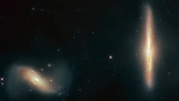 NASAâ€™s Hubble Telescope Captures â€˜Dynamic Galactic Duoâ€™ 250 Million Light-Years From Earth