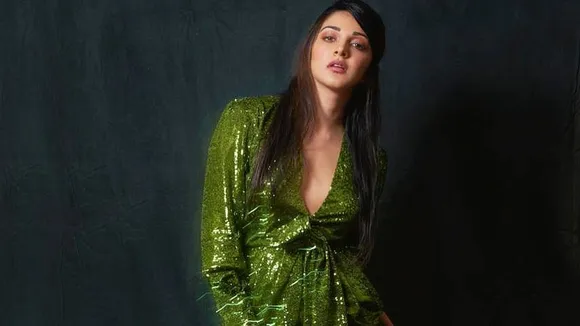 Kiara Advani Ups The Glamour Quotient In Olive Green Shimmery Dress