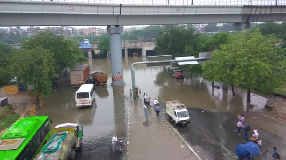 Delhi inundated after heavy rains, buses take dip
