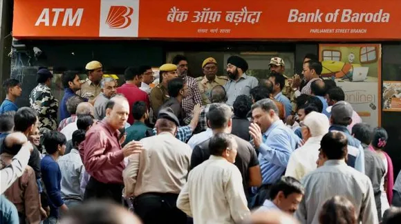 Heavy rush at ATMs, long queues, exhausted public, machines drying easily