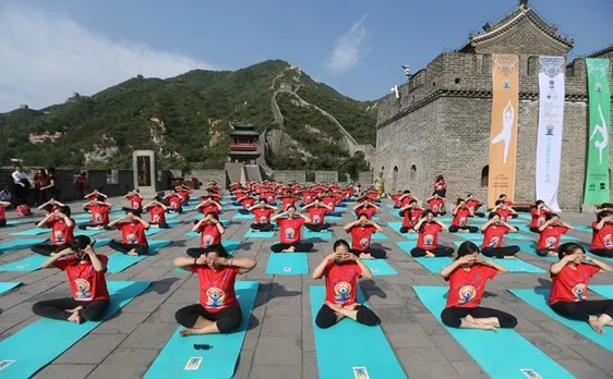 3rd International Yoga Day World stretches and twists to celebrate yoga day