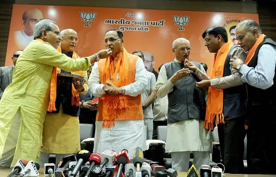 BJP to form governments in Gujarat Himachal Pradesh celebrations at party HQs across country