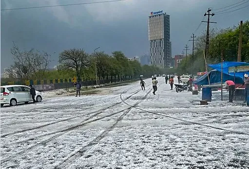 In Pics: National capital or Kashmir? Thick blanket of hails covers Delhi-NCR streets
