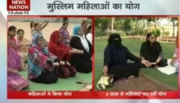 Muslim women perform Yoga