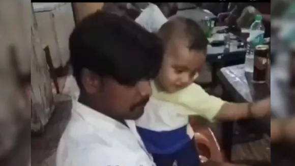 father feed wine her daughter